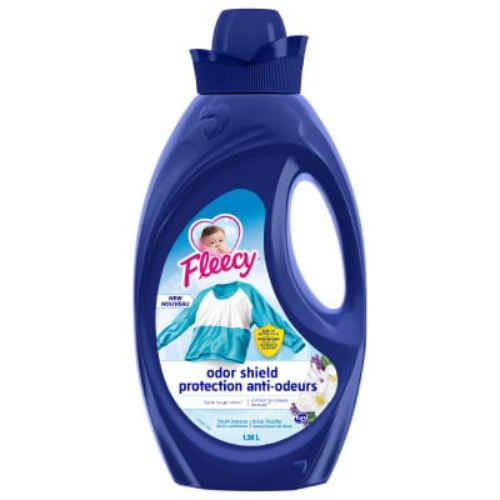 Fleecy Odor Shield 1.36L liquid fabric softener in a dark blue bottle, featuring baby logo, a blue shirt, and white flowers for tough odor protection.