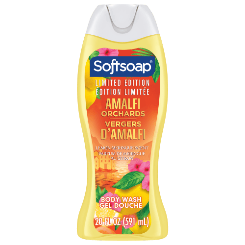 Front view of a 20-fluid-ounce bottle of Softsoap moisturizing body wash, "Amalfi Orchards" limited edition. The label depicts a Mediterranean orange grove scene, featuring orange trees, terracotta pots, and white flowers, set against a coastal landscape background