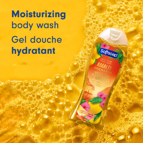 The Amalfi Orchards shower gel bottle, resting on a bed of golden-yellow water bubbles. The text on the left reads "Moisturizing body wash" and "Gel douche hydratant."