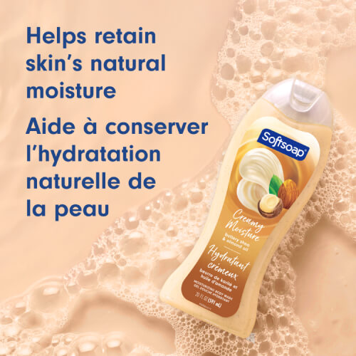 Softsoap Buttery soap bottle with shea butter and almond oil on a frothy beige background. Text in English and French: Helps retain skin's natural moisture.