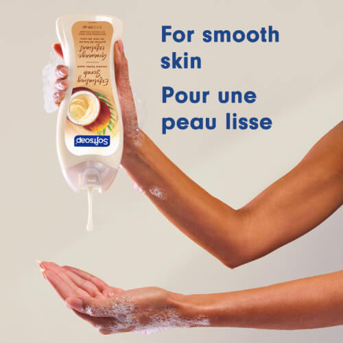 A macro view of the creamy white texture of the exfoliating body cleanser, revealing fine exfoliating particles. The text, in English and French, reads: Gentle exfoliation.