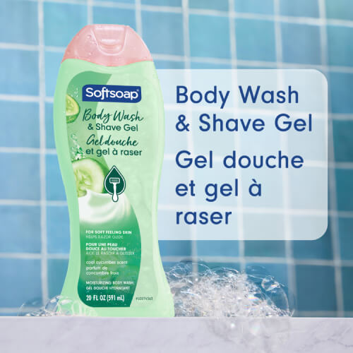 Softsoap Cool Cucumber Body Wash and Shave Gel bottle in a blue bathroom setting. Text in English and French: Body Wash & Shave Gel, Gel douche et gel à raser.