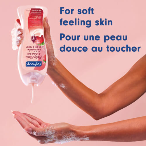 Pink, creamy Softsoap liquid being poured into a hand to show the moisturizing formula. Text in English and French: For soft feeling skin, Pour une peau douce au toucher.