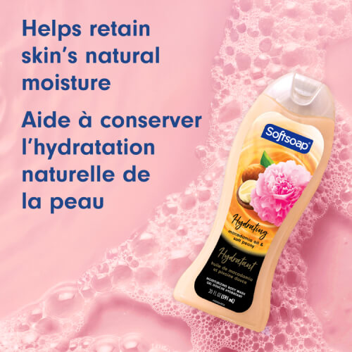 Softsoap bottle resting in soft pink water with white bubbles. Text reads "Helps retain skin’s natural moisture" and "Aide à conserver l’hydratation naturelle de la peau."