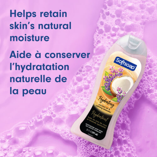Softsoap bottle resting on purple water with foam. Text in English and French reads: Helps retain skin’s natural moisture. Aide à conserver l’hydratation naturelle de la peau.
