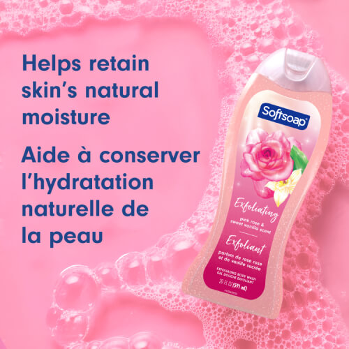 The Softsoap Pink Rose and Sweet Vanilla bottle shown at an angle, surrounded by pink soapy suds. Text reads "Helps retain skin’s natural moisture" and "Aide à conserver l’hydratation naturelle de la peau."