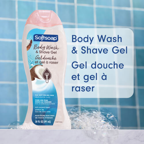 Softsoap Rich Coconut Body Wash and Shave Gel bottle against blue bathroom tiles with bubbles. Text in English and French: Body Wash & Shave Gel, Gel douche et gel à raser.