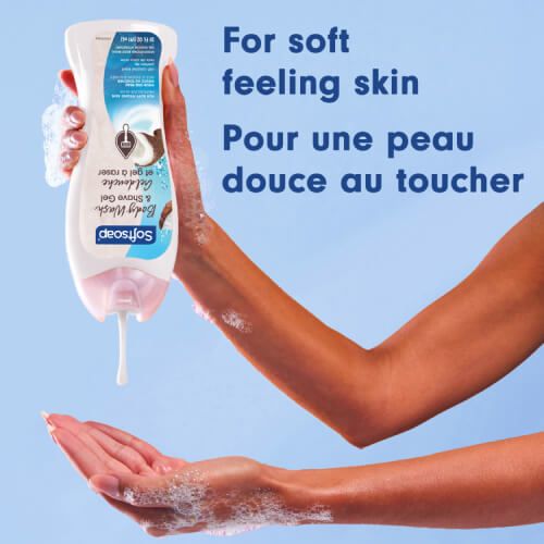 A person pours white, moisturizing Softsoap liquid from the bottle into their hand. Text in English and French: For soft feeling skin, Pour une peau douce au toucher.