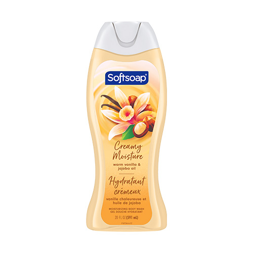 A high-resolution front view of the Softsoap Warm Vanilla & Jojoba Oil Moisturizing Body Wash bottle. The label features a swirling golden design with vanilla flowers and jojoba nuts, identifying it as "Creamy Moisture."